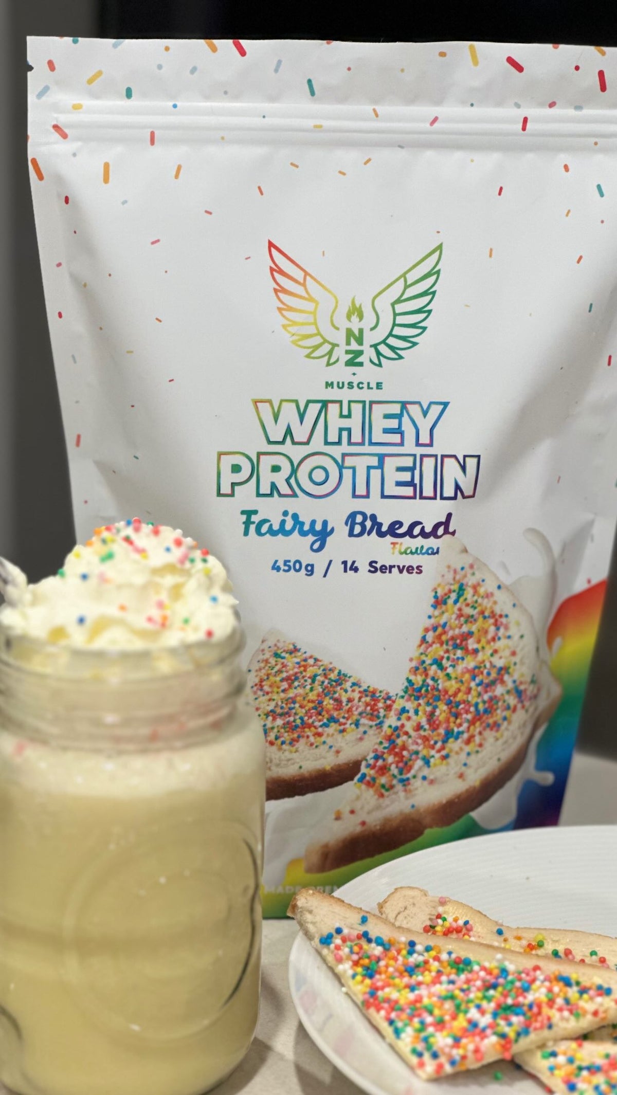 Creaming soda Fairy Bread protein shake topped with whipped cream and sprinkles