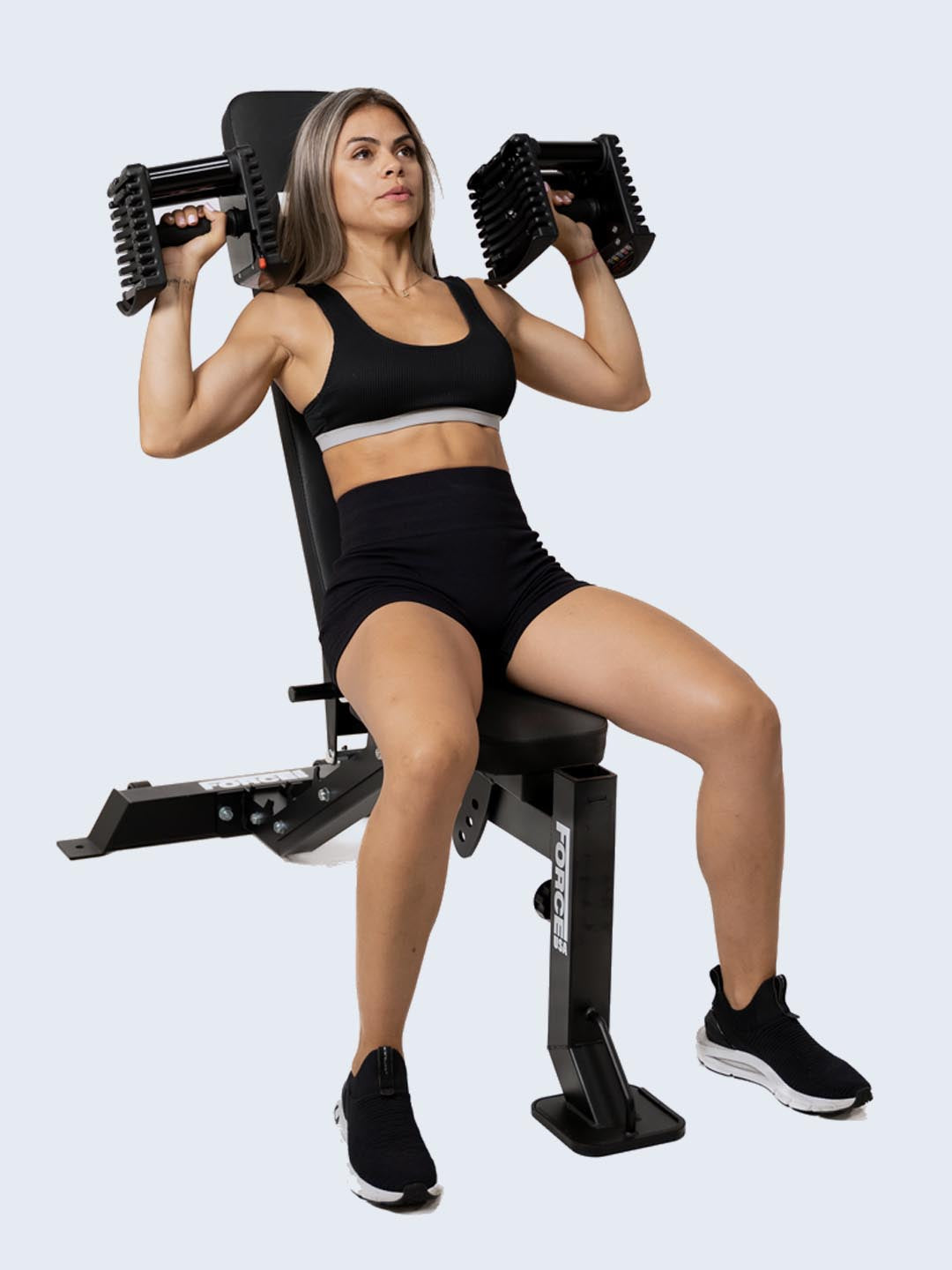 Force USA FID Bench preacher curl in use