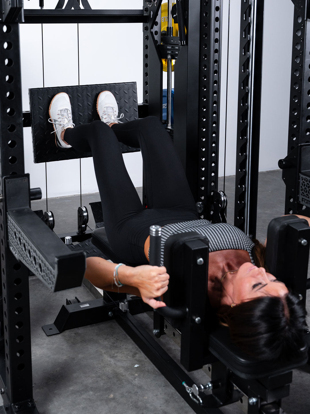 Force USA Sliding Bench hack squat in use