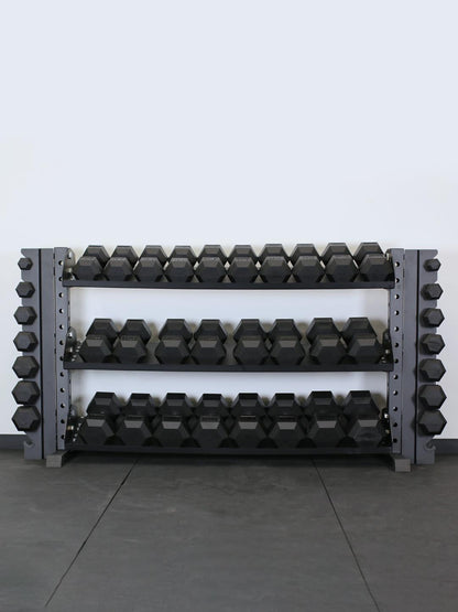 Force USA rubber hex dumbbells on a rack